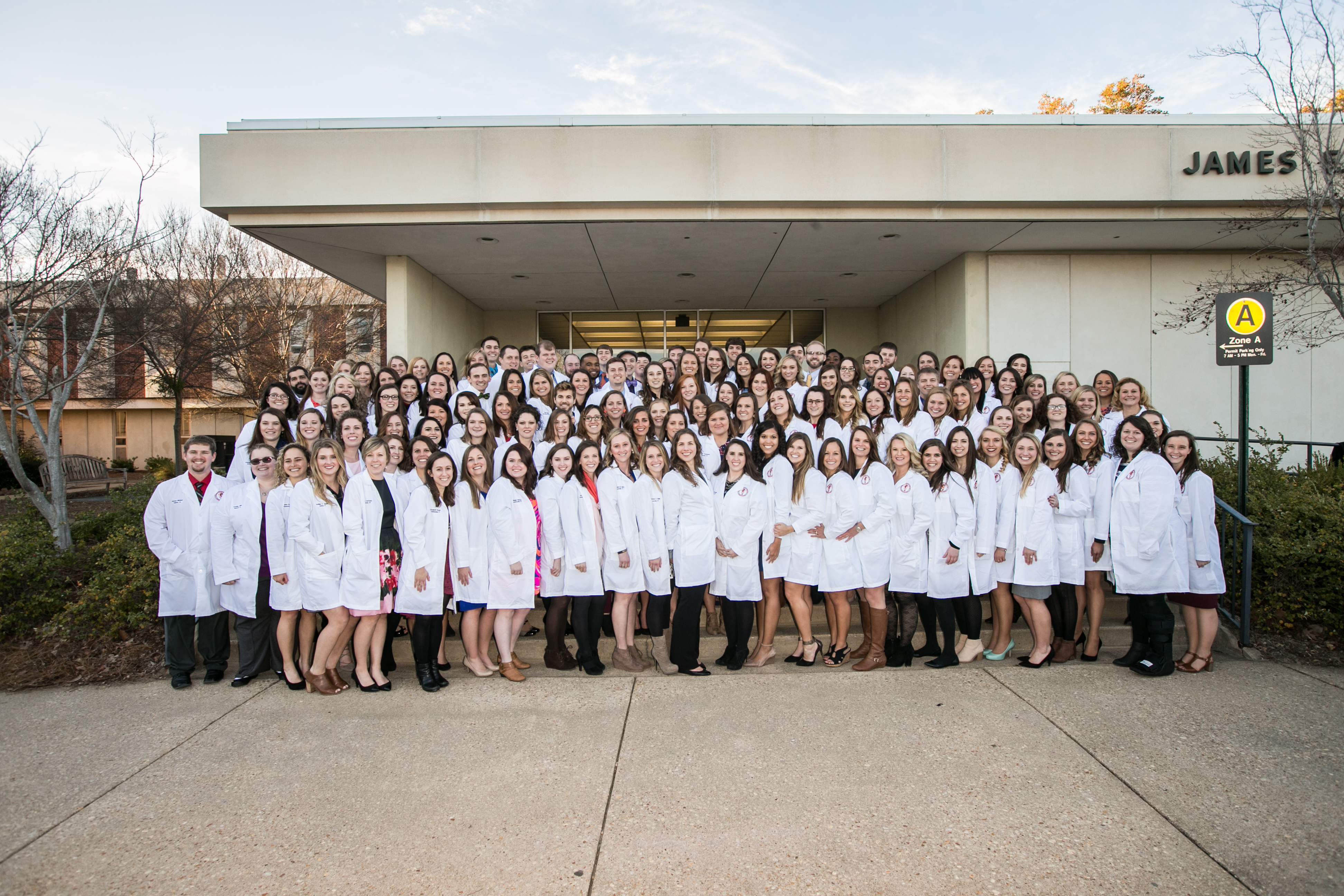 Members of the  class of 2018 pose for their group photo following the White Coat Ceremony in 2017.