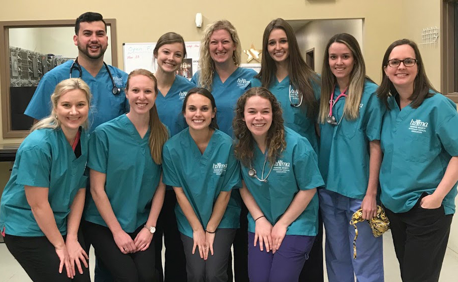 Group photo of students and veterinarians who volunteered at spay/neuter clinic.