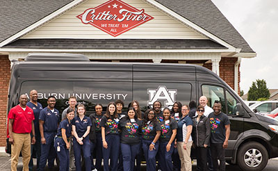 Students in front of van