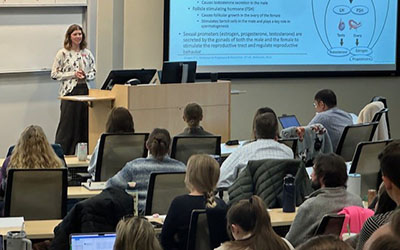 Student presenting in front of group