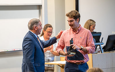 Student receiving an award