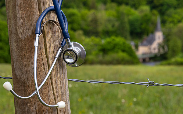 Stethoscope on fence post